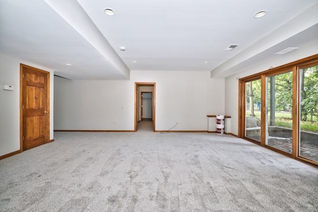 empty room featuring light carpet