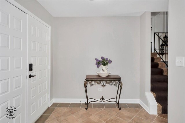 entrance foyer with tile patterned flooring