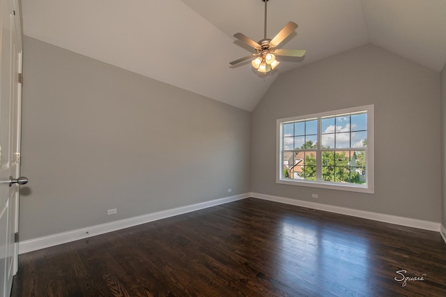 unfurnished room with ceiling fan, dark hardwood / wood-style floors, and vaulted ceiling