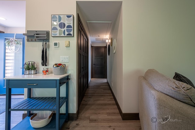 hallway featuring dark hardwood / wood-style floors