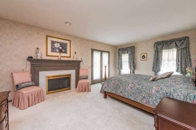 carpeted bedroom with multiple windows