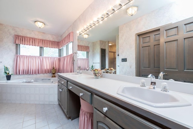 bathroom with plus walk in shower, tile patterned flooring, and vanity