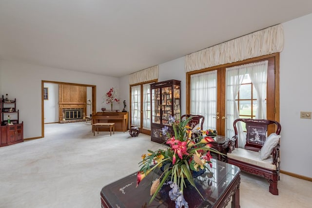 carpeted living room featuring french doors