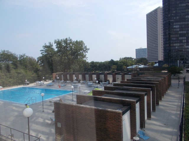 view of swimming pool with a patio