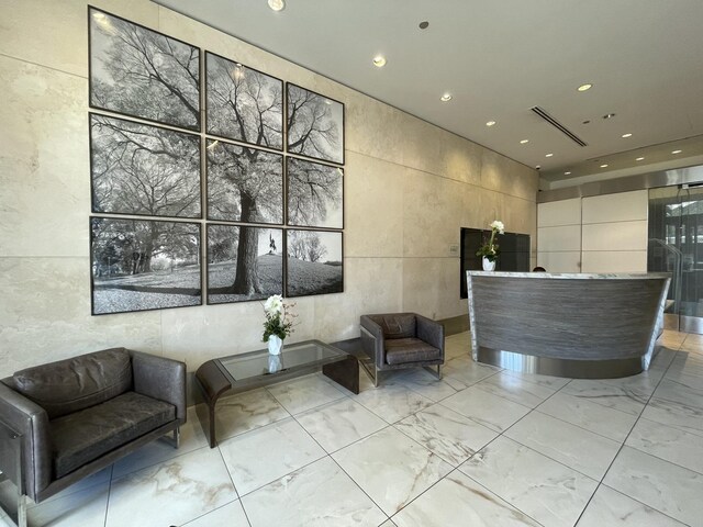 1160 S Michigan Ave Unit 1107, Chicago, IL 60605 - welcome area with recessed lighting and tile walls