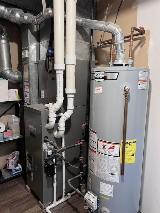 utility room featuring gas water heater