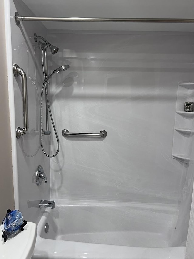 full bathroom with  shower combination and toilet