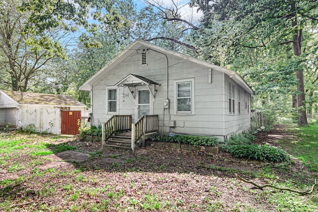 view of front facade with a shed