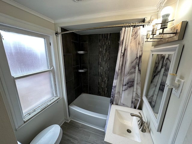 full bathroom featuring crown molding, sink, shower / bath combination with curtain, and toilet