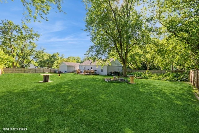 view of yard with a wooden deck