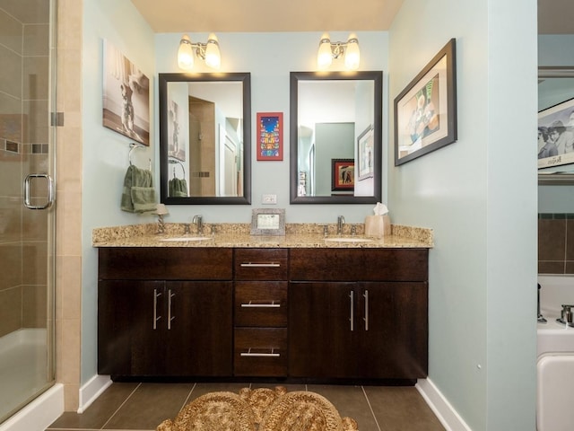 bathroom with tile patterned flooring, a notable chandelier, a shower with door, and vanity