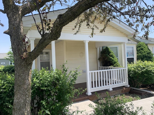 view of home's exterior featuring covered porch