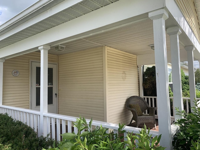 view of home's exterior featuring covered porch