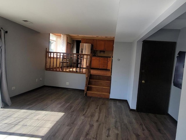 interior space with dark hardwood / wood-style flooring