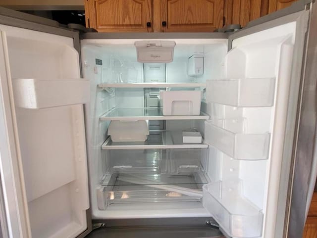 room details featuring white fridge