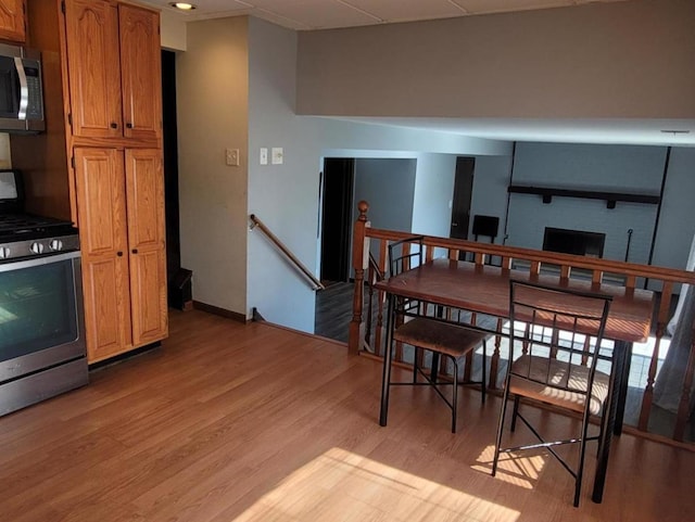 dining area with light hardwood / wood-style floors