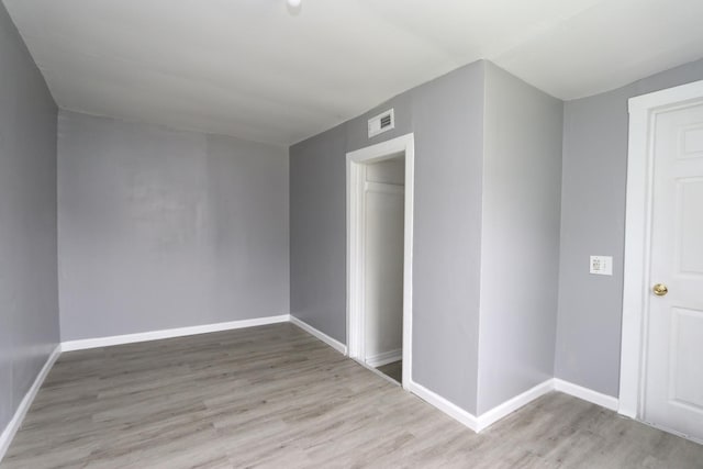 empty room featuring light hardwood / wood-style floors