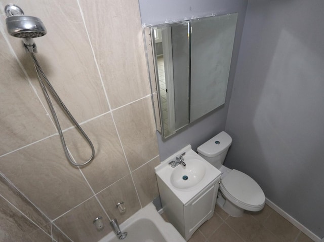 full bathroom with tile patterned floors, vanity, toilet, and washtub / shower combination