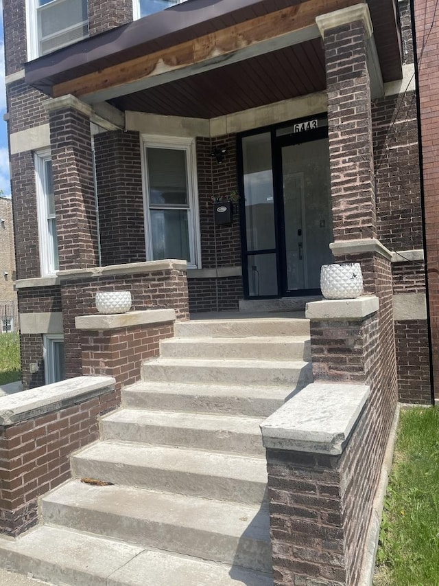 entrance to property with covered porch