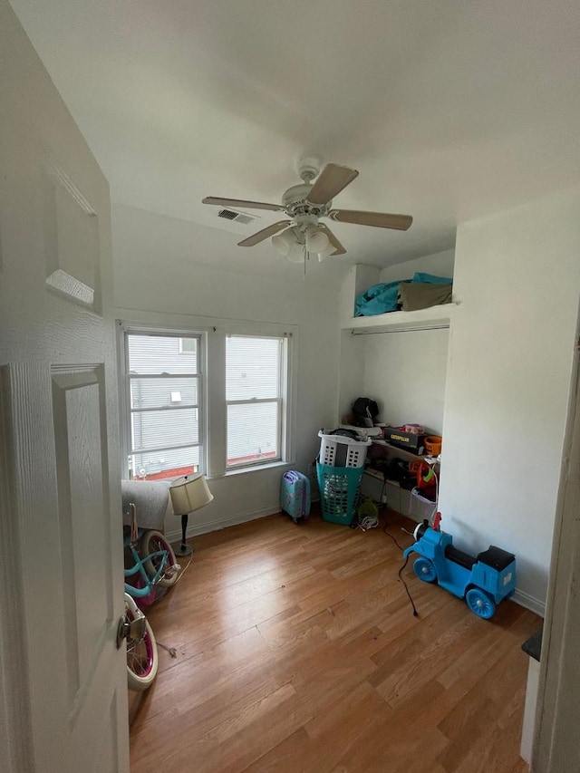 storage area featuring ceiling fan