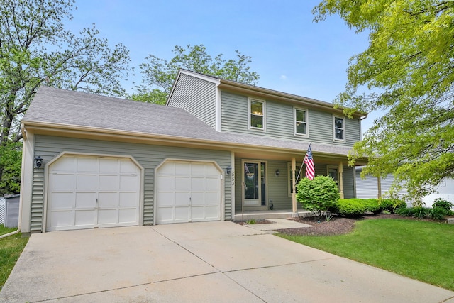1553 Marquette Ave, Naperville, IL 60565 - traditional-style house featuring a porch, an attached garage, driveway, and a front lawn