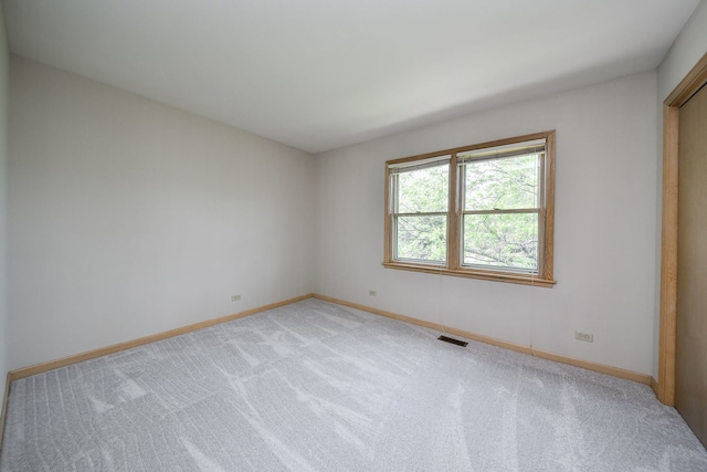1553 Marquette Ave, Naperville, IL 60565 - empty room with light colored carpet and baseboards