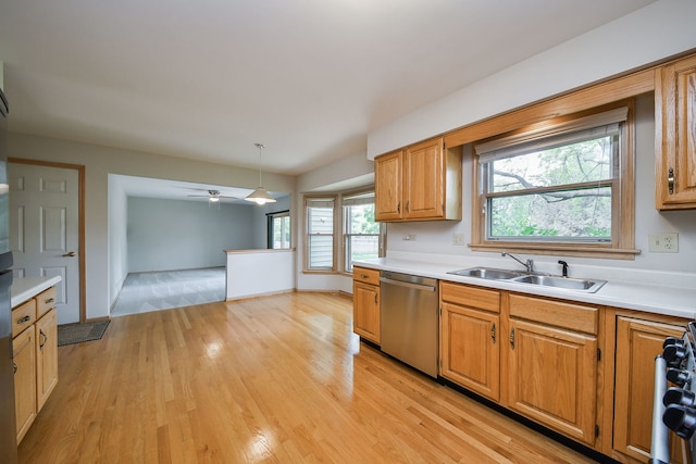 1553 Marquette Ave, Naperville, IL 60565 - kitchen with dishwasher, a sink, light wood finished floors, light countertops, and stove