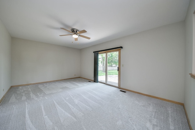 1553 Marquette Ave, Naperville, IL 60565 - unfurnished room featuring a ceiling fan, baseboards, and light carpet
