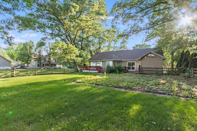 view of yard with a deck