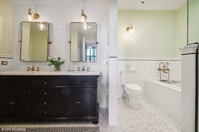 bathroom featuring tile floors, a washtub, tile walls, dual vanity, and toilet