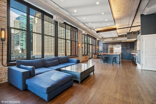 lobby with dark hardwood / wood-style floors