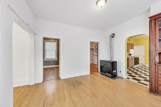 unfurnished living room with light hardwood / wood-style flooring