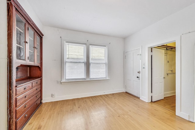 unfurnished bedroom with light hardwood / wood-style floors