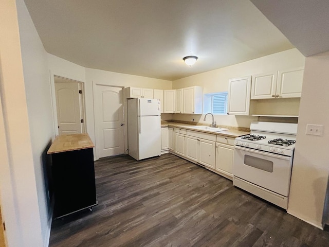 kitchen featuring white cabinetry, dark hardwood / wood-style flooring, white appliances, and sink