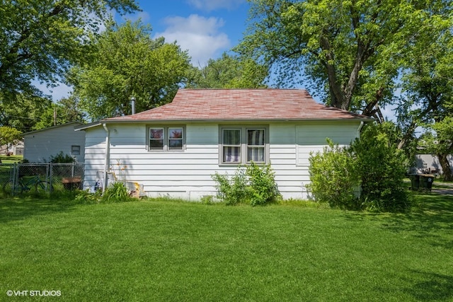 exterior space featuring a lawn