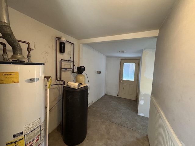 utilities featuring radiator and gas water heater