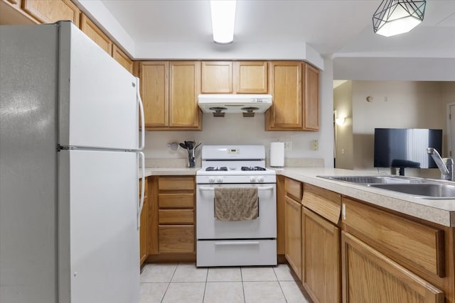 kitchen featuring white appliances and light tile floors