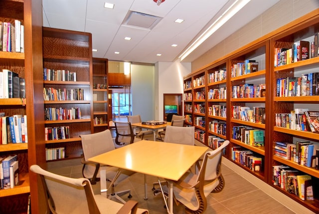 home office with tile patterned floors