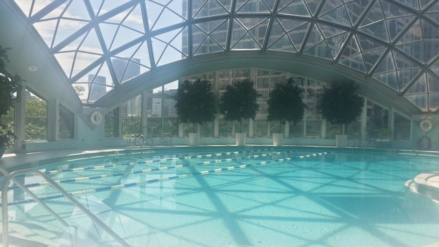 view of pool with a lanai