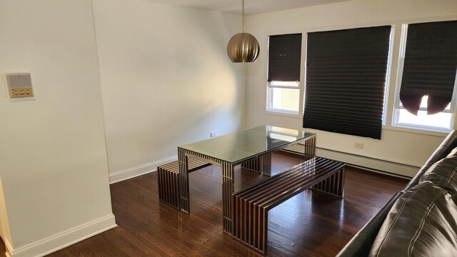824 N Austin Blvd Unit 3E, Oak Park, IL 60302 - unfurnished dining area featuring baseboards, wood finished floors, and a baseboard radiator