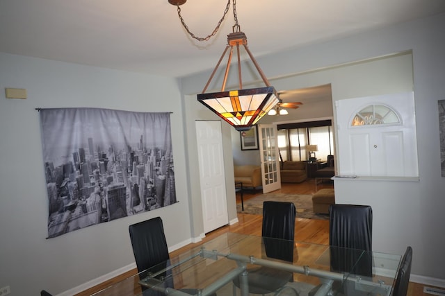 1040 N Austin Blvd, Oak Park, IL 60302 - dining space with baseboards and wood finished floors