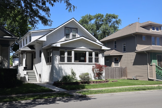 view of front of property with a front lawn