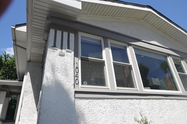 1040 N Austin Blvd, Oak Park, IL 60302 - view of side of home featuring stucco siding