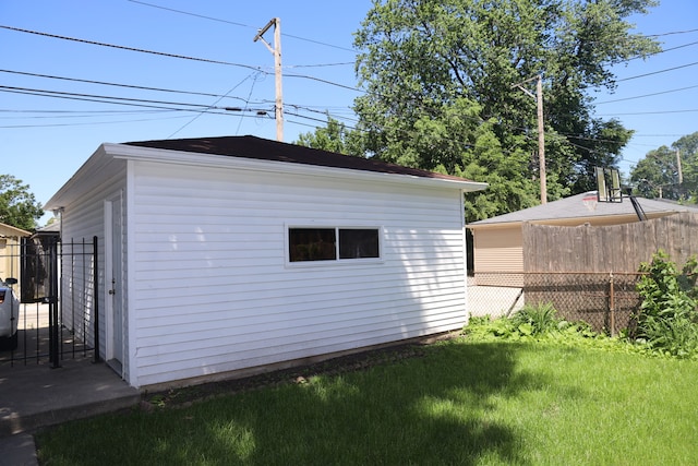 view of shed / structure with a yard