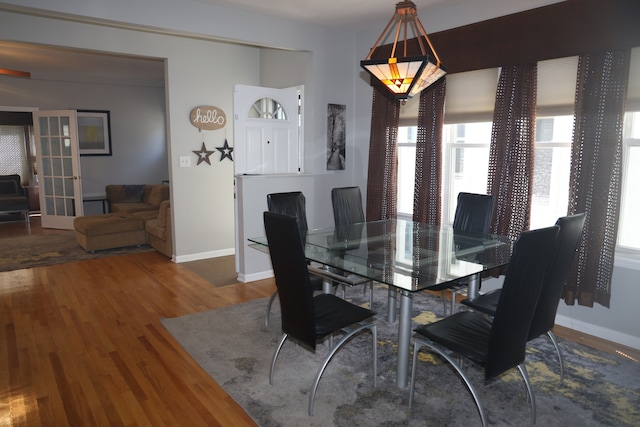 dining space featuring hardwood / wood-style flooring