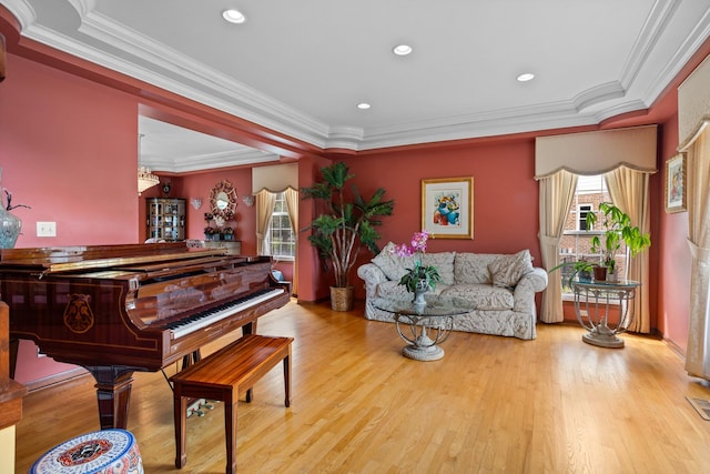 interior space featuring light hardwood / wood-style floors and crown molding