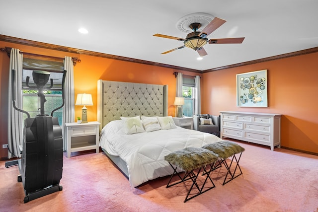 bedroom with ornamental molding, light colored carpet, and ceiling fan