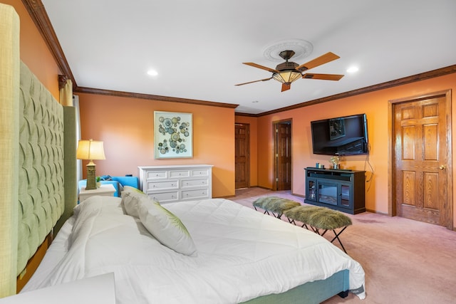 bedroom featuring ornamental molding, light colored carpet, and ceiling fan