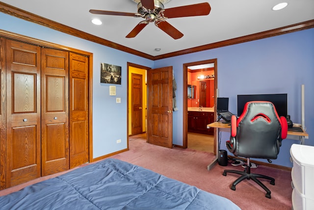 bedroom featuring connected bathroom, light carpet, ceiling fan, a closet, and crown molding