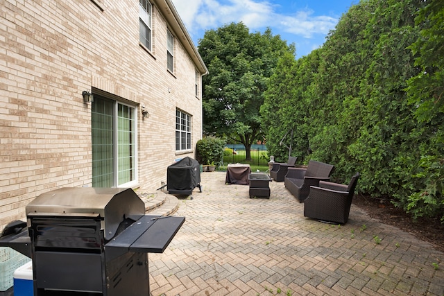 view of patio / terrace with a grill and outdoor lounge area